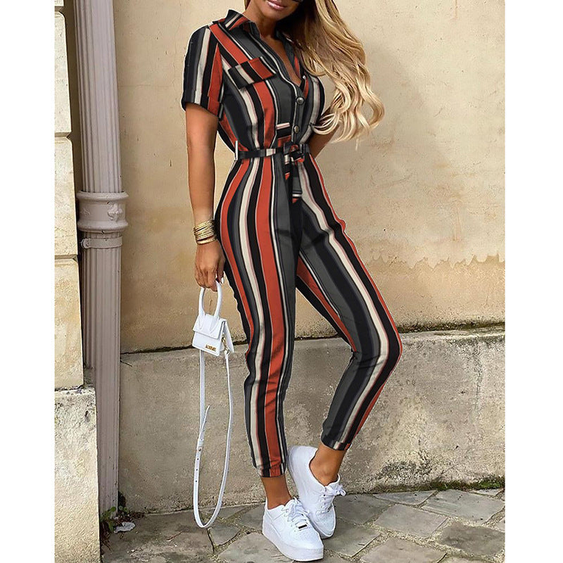 Your statement jumpsuit with buttoned lapels and printed belt!