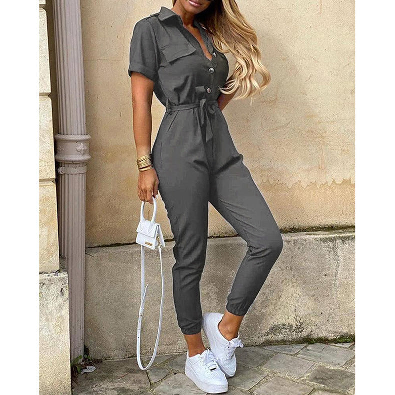 Your statement jumpsuit with buttoned lapels and printed belt!